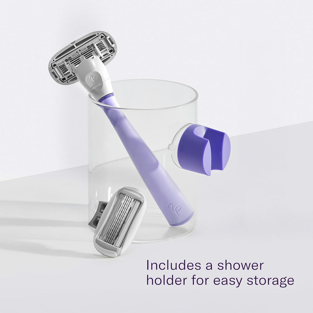 Flamingo shower holder mounted on tile keeping razor dry and handy