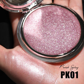 FOCALLURE swatches on forearm demonstrating blendable pinkish glow benefit