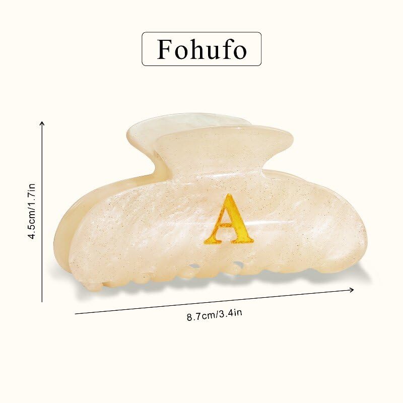 Fohufo Letter A size comparison in hand showing its generous jaw for larger hair sections
