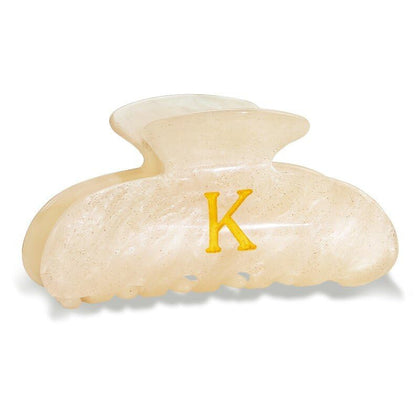Fohufo front view of Letter K gold glitter clip showing monogram detail and style benefit