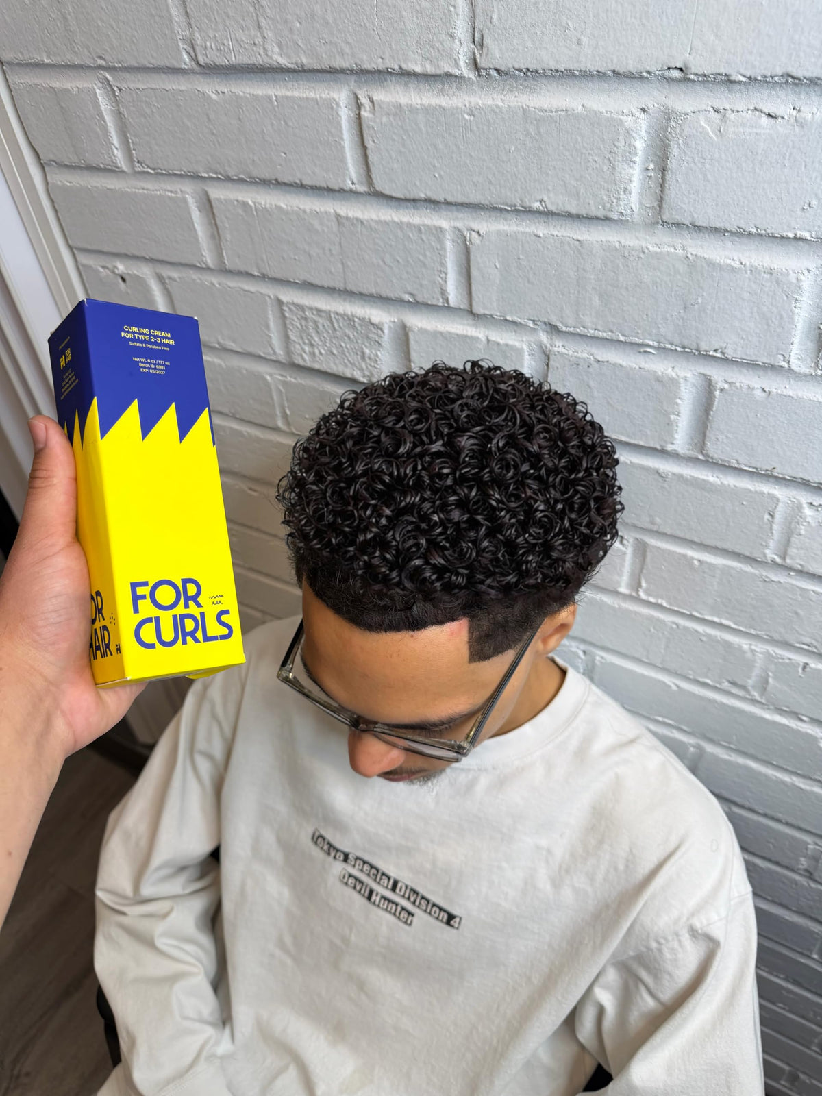 FOR CURLS lifestyle bathroom shelf shot suggesting everyday routine and calming lavender scent