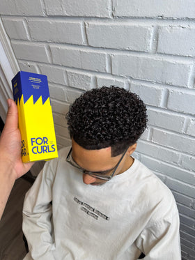 FOR CURLS lifestyle bathroom shelf shot suggesting everyday routine and calming lavender scent