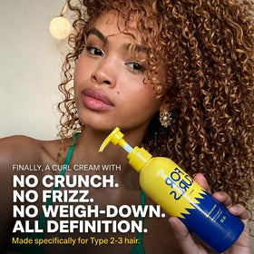 FOR CURLS close-up texture of cream on fingertip highlighting lightweight, non-greasy feel