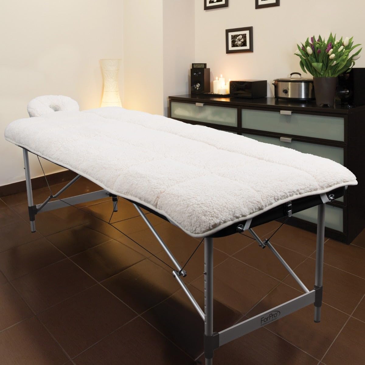 ForPro on massage table in treatment room showing professional presentation