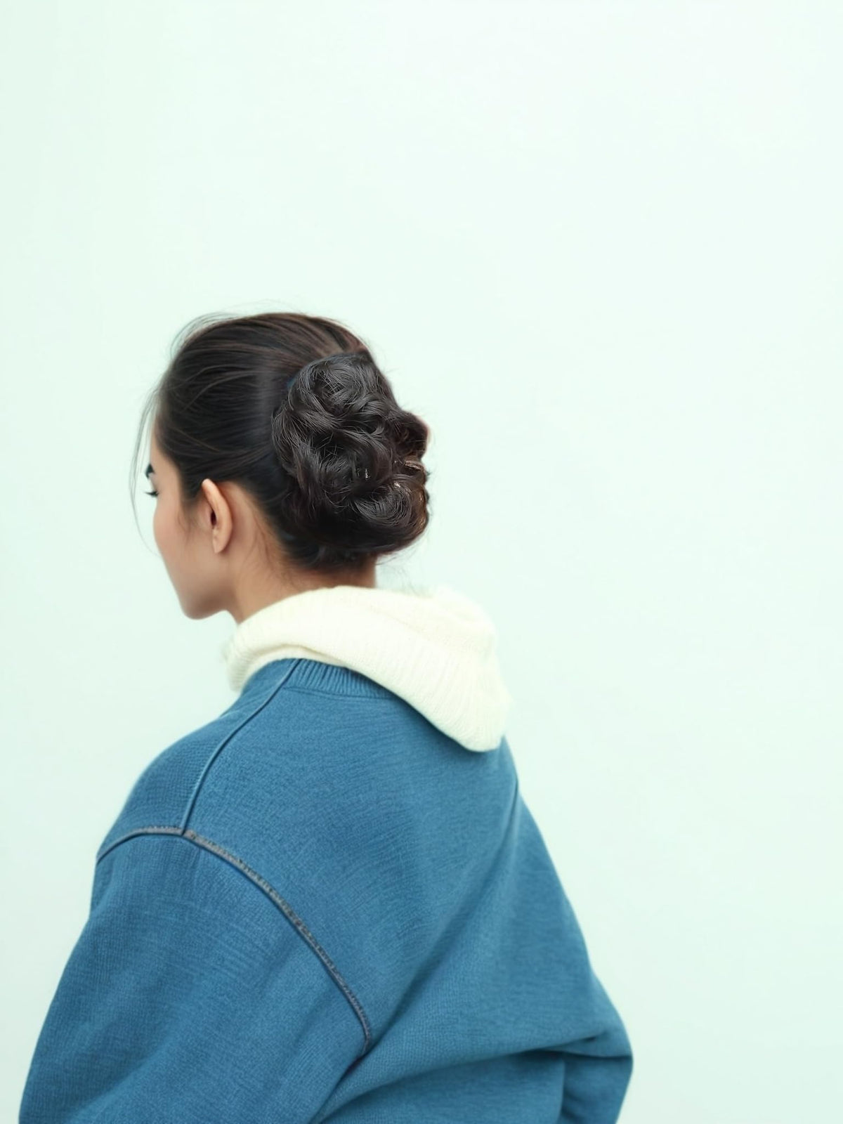 Fosrisix worn back style showing blended bun and seamless coverage