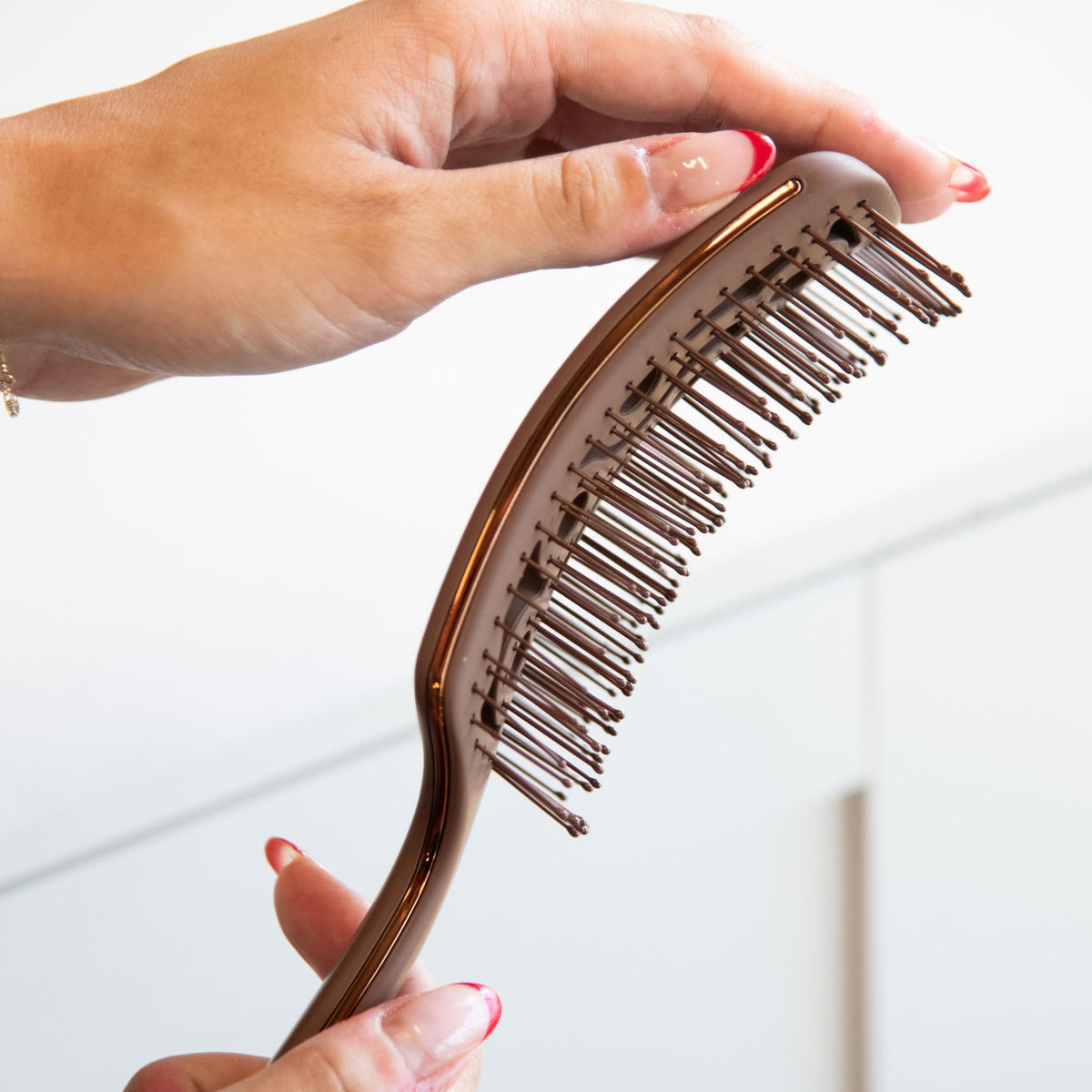 FRAMAR brush styling extensions to protect and preserve hair pieces