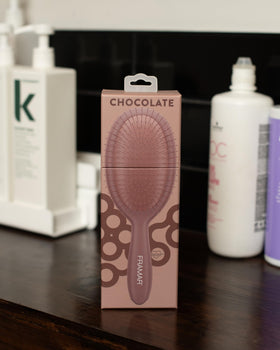FRAMAR brushing dry hair to smooth frizz and boost shine quickly