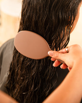 FRAMAR brush held in hand for scale, demonstrates comfortable control
