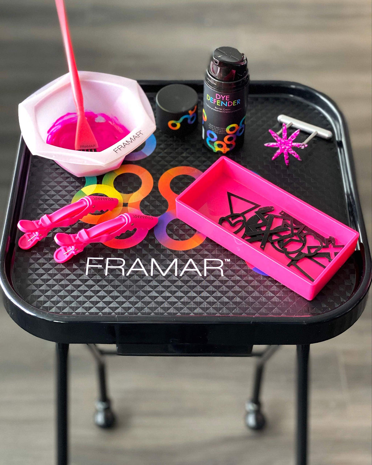 FRAMAR salon lifestyle photo with stylist using barrier cream for client comfort