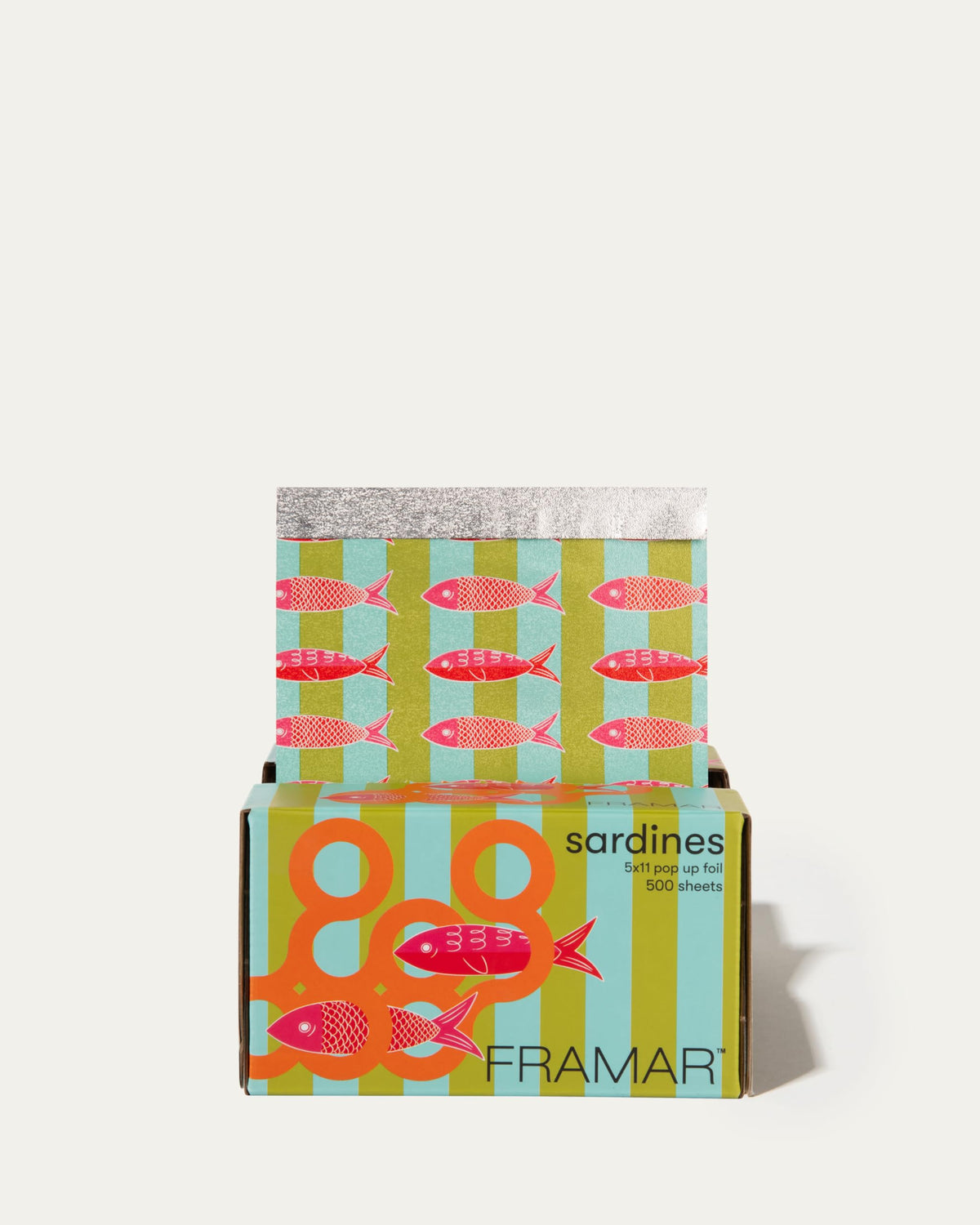 FRAMAR colorful foils on a stylist station creating a playful professional look