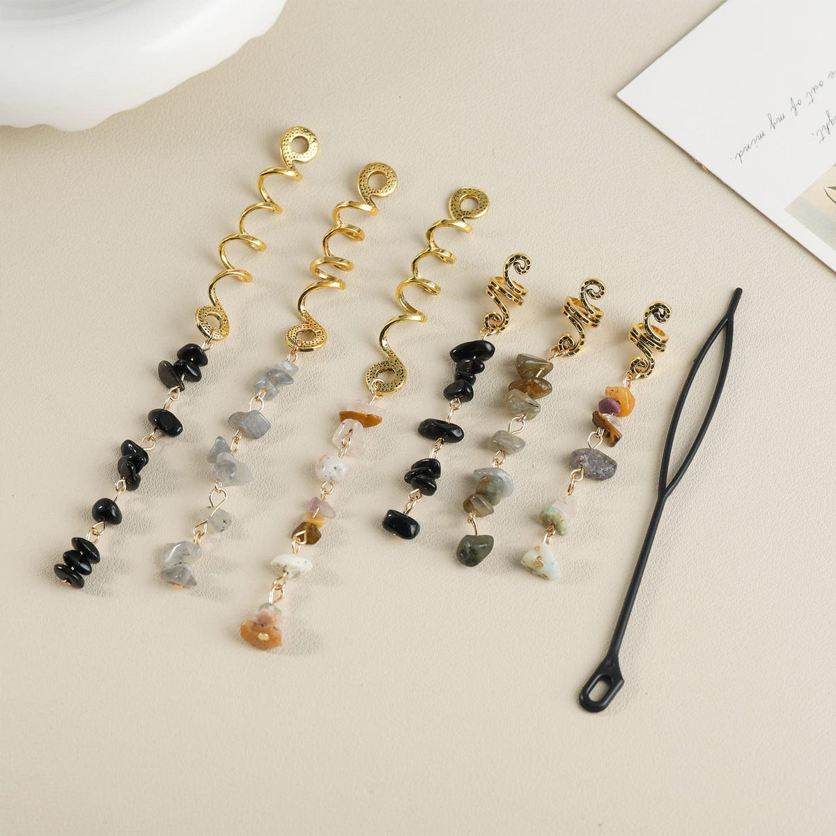 FRDTLUTHW charms beside a coin showing scale and lightweight convenience for daily wear
