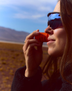 Freaks of Nature stick in use on face at beach for active sun protection
