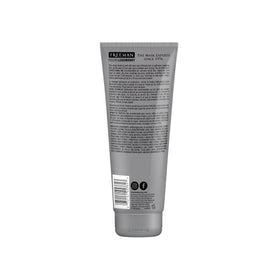 Freeman tube held in hand to show 175 mL size and travel-friendly benefit