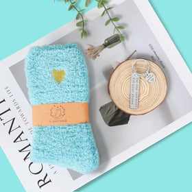 Frerdui opened box flatlay revealing all eight curated items for thoughtful gifting