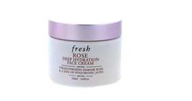 Fresh cream texture in open jar, highlights lightweight smooth moisture