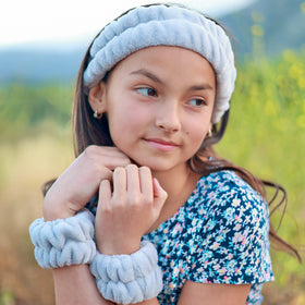 FROG SAC headband stretched to show elastic comfort and secure hold