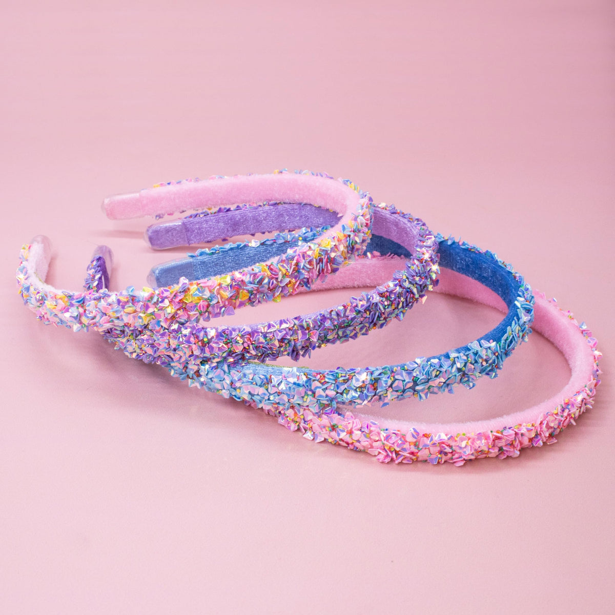 FROG SAC multicolor headbands flat lay showing pink, purple, blue, rainbow for outfit matching