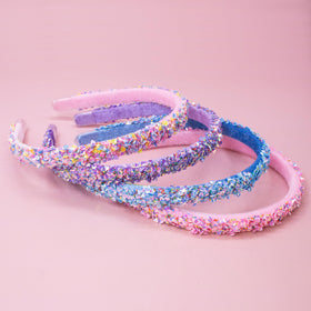 FROG SAC multicolor headbands flat lay showing pink, purple, blue, rainbow for outfit matching