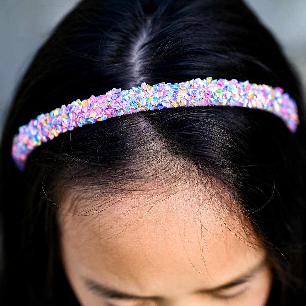 FROG SAC headband beside ruler for scale showing 13-inch fit for kids to teens