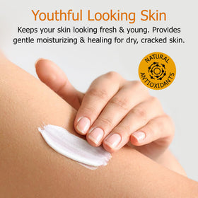 Fruit of the Earth lotion texture closeup showing creamy, non-greasy finish