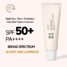 fruitery Relief Sun tube held in hand showing compact travel size