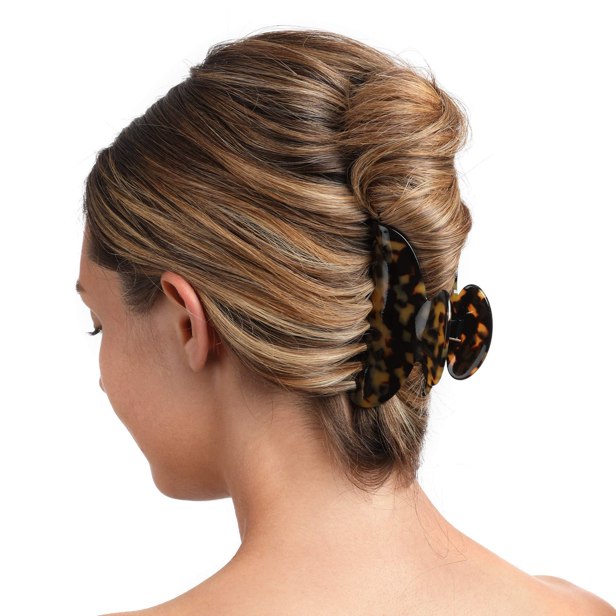 Fsmiling clips securing half-up hairstyle illustrating quick, tidy styling benefit