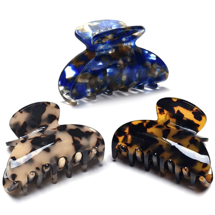 Fsmiling front packaging showing three tortoise clips, stylish everyday hold
