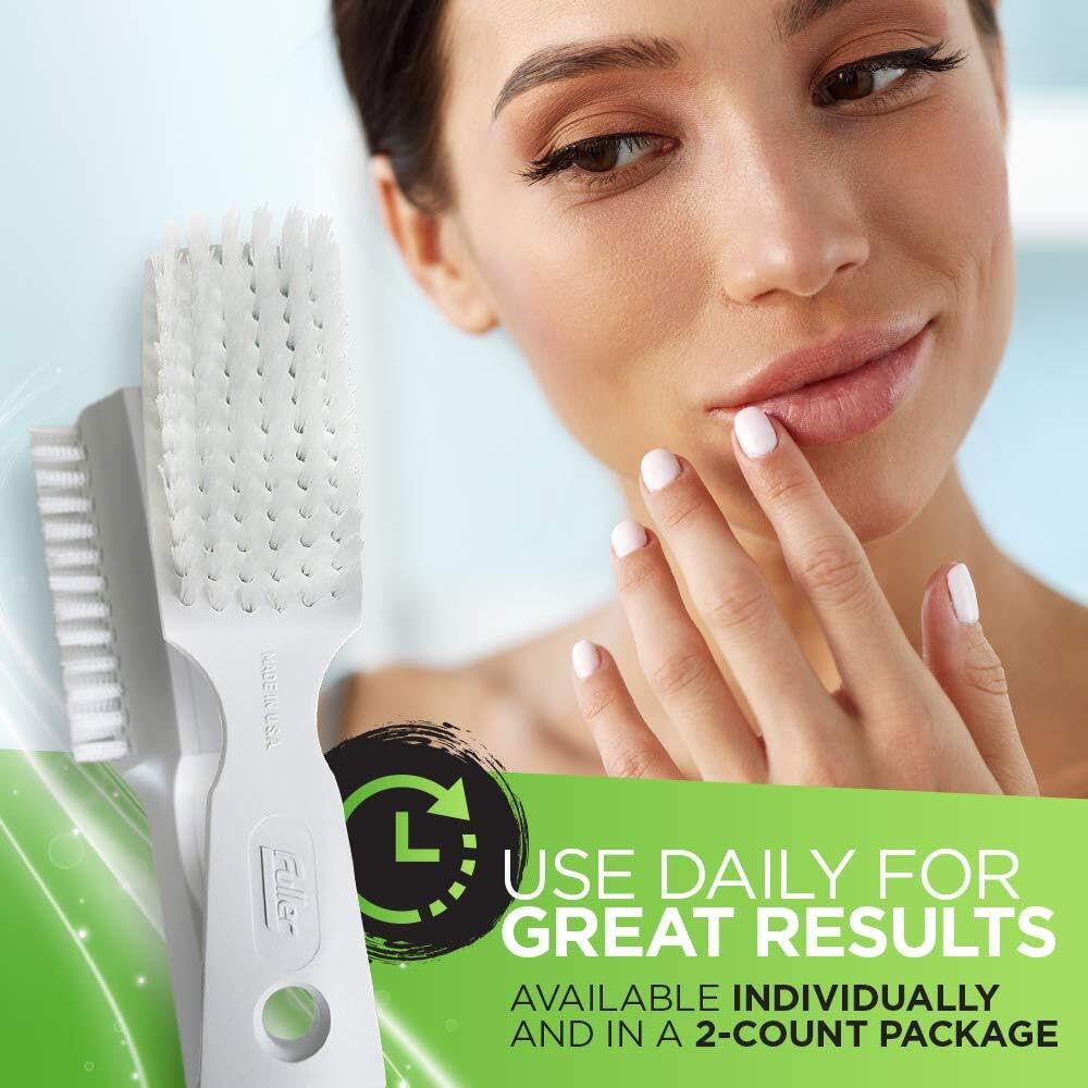 Fuller Brush held in hand showing ergonomic grip for comfortable scrubbing