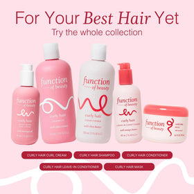 Function of Beauty applying conditioner to wet curls for easier detangling benefit