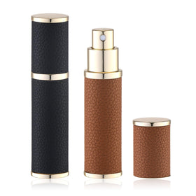 Fusupak front view of two-piece atomizer set showing neat case and caps, travel convenience