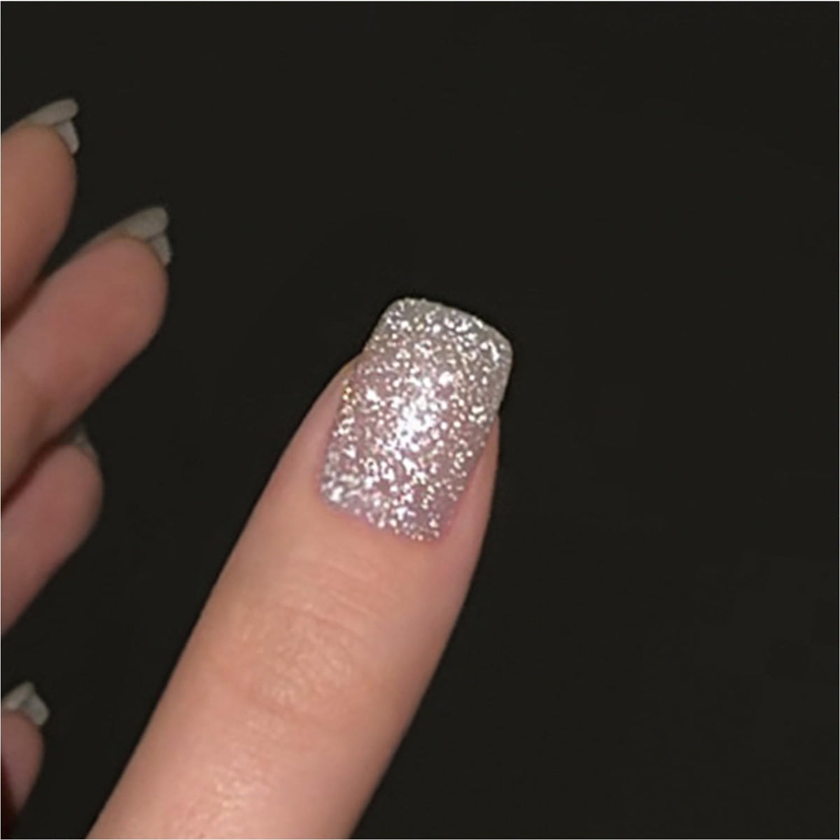 GAOY applied on a nail tip cured under lamp showing mirror-like sparkle