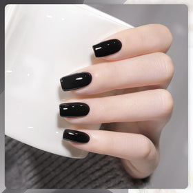 GAOY swatch on nail press demonstrating full coverage black color
