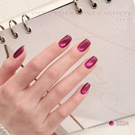 GAOY magnet held over wet polish, demonstrates how to form cat-eye lines