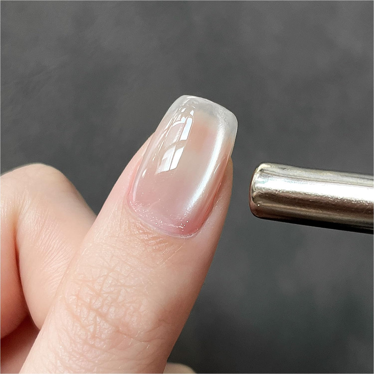 GAOY finished manicure in lifestyle setting showing salon-quality shimmer for confidence