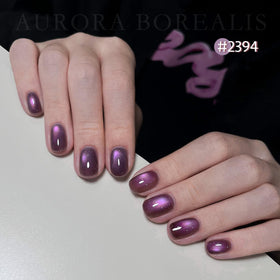 GAOY magnet detail held above polish creating cat-eye streak for precise designs