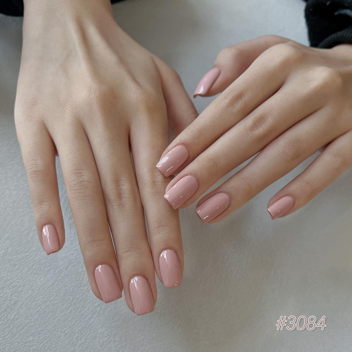 GAOY model hand with peach pink nails showing wearable salon finish benefit