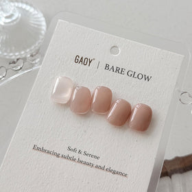 GAOY bottle next to common items to show 16ml size and travel-friendly benefit
