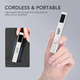 GAOY next to smartphone showing scale and travel-friendly portability