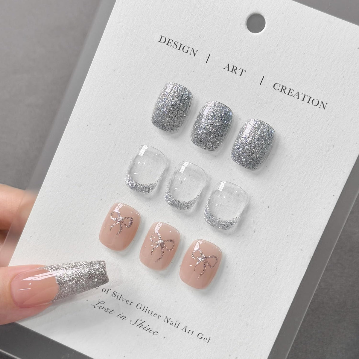 GAOY thin brush close-up painting a silver glitter stroke for precision