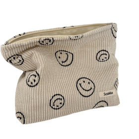 Gardsell front view beige corduroy pouch shows smile-dot design and stylish storage
