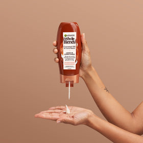 Garnier conditioner paired with shampoo to show complete smoothing routine