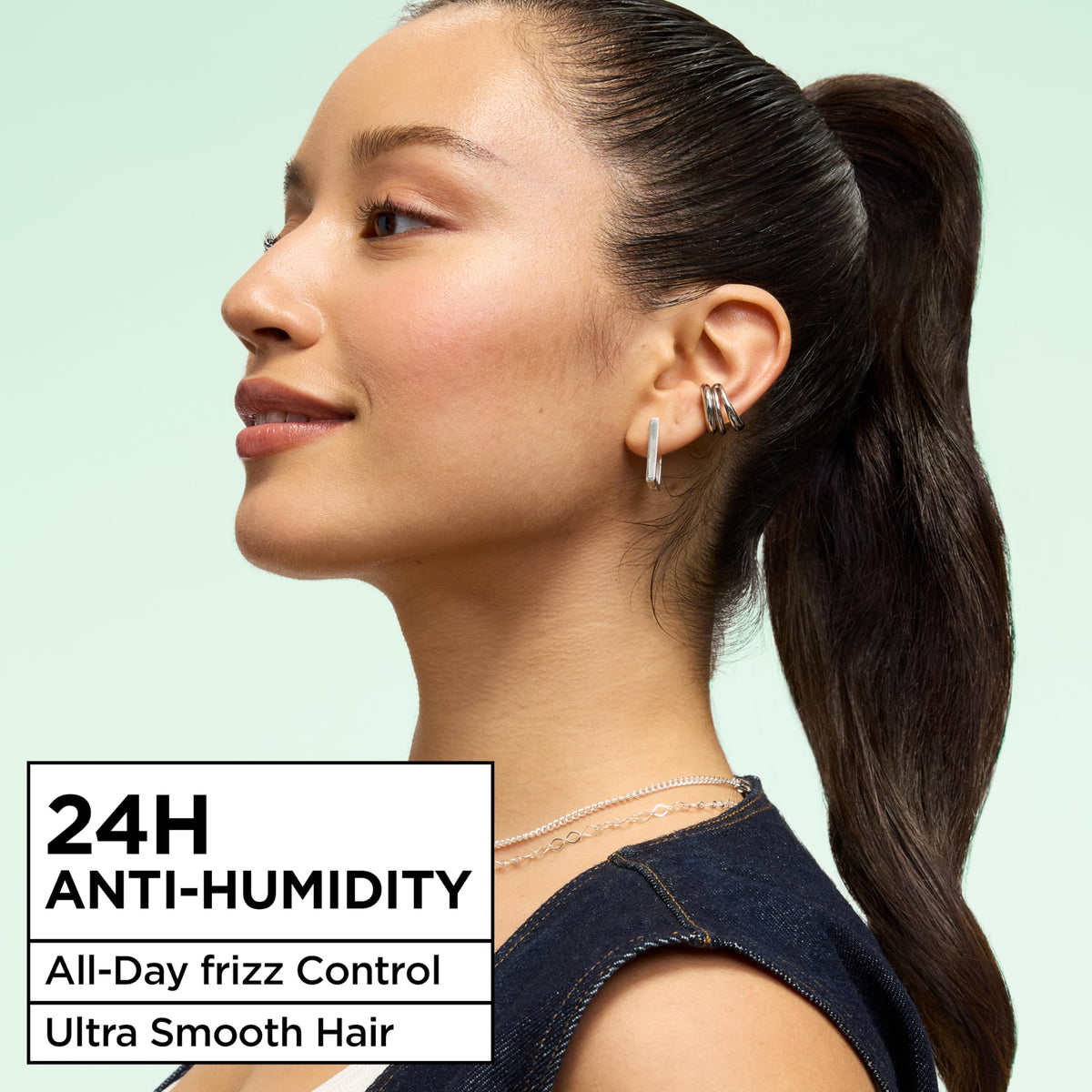 Garnier Fructis aerosol nozzle close-up showing precise mist application benefit