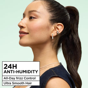 Garnier Fructis aerosol nozzle close-up showing precise mist application benefit