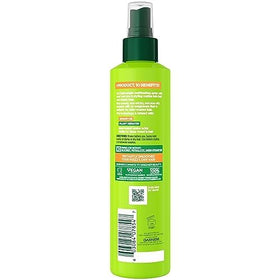 Garnier Fructis bottle on bathroom shelf in routine setting for daily styling
