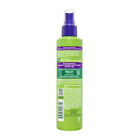 Garnier Fructis on bathroom counter with styling tools for routine