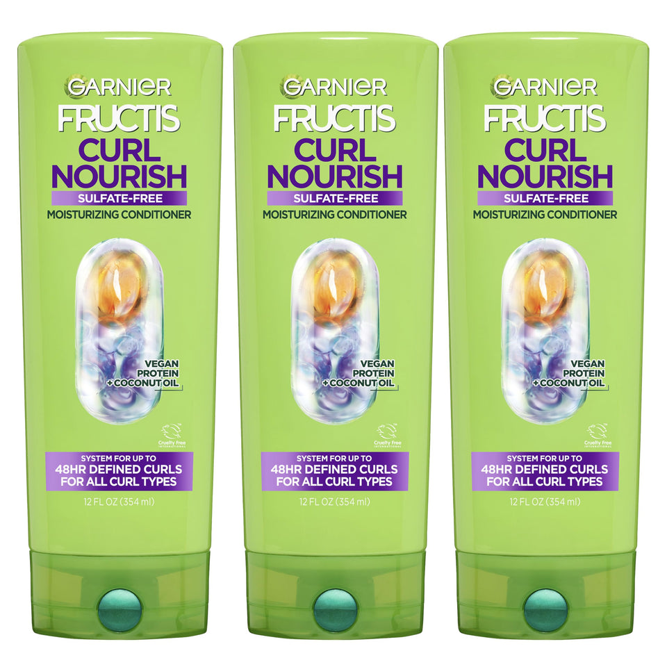 Garnier Fructis front packaging showing curl nourish conditioner benefits