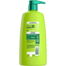 Garnier Fructis Grow Strong conditioner texture close-up on palm, demonstrates smooth detangling and nourishment