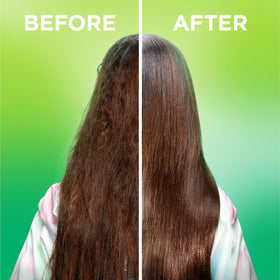 Garnier Fructis in use during blowdry to protect from heat and reduce frizz