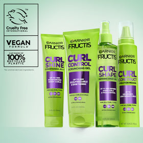 Garnier bottles on bathroom shelf in routine setting promoting daily use