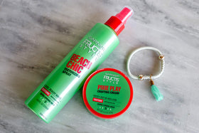 Garnier Fructis Pixie Play styling in use on short hair showing defined, touchable texture